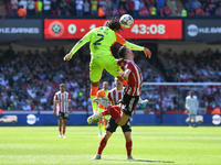 Djed Spence of Nottingham Forest competes for the ball with Jack Robinson of Sheffield United during the Sky Bet Championship Play-Off Semi...
