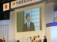 Japan’s Emperor Naruhito gives virtual speech from Tokyo during the ceremony celebrating the 50th anniversary of Okinawa’s return to Japanes...