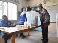 Citizens arrive to cast their votes at a polling station during general elections in Beirut, Lebanon on May 15, 2022. (