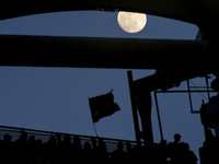 The moon over the Olympic Stadium during the Serie A match between AS Roma and Venezia Fc on May 14, 2022 in Rome, Italy.  (