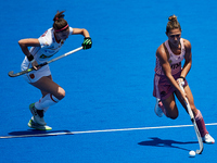 Agustina Gorzelany (R) of Argentina competes for the ball with Florencia Amundson of Spain during the FIH Hockey Pro League Women game betwe...