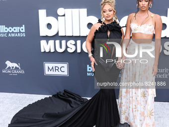 Latto (Alyssa Michelle Stephens) and Brooklyn Nikole arrive at the 2022 Billboard Music Awards held at the MGM Grand Garden Arena on May 15,...