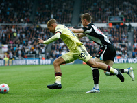 Emile Smith Rowe of Arsenal is fouled by Emil Krafth of Newcastle United during the Premier League match between Newcastle United and Arsena...