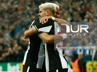  Burno Guimaraes of Newcastle United celebrates with Joelinton of Newcastle United after scoring their sides first goal during the Premier L...