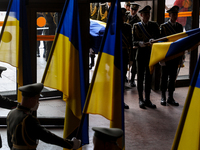 Servicemen of Honor Guard carry the coffin with the body of the first president of Ukraine Leonid Kravchuk in Kyiv, Ukraine, May 17, 2022. D...