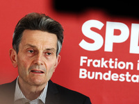 Chairman of the Social Democratic Party (SPD) Parliamentary Group Rolf Muetzenich gives a statement to the media prior to the meeting in Bun...