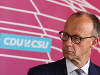 Chairman of the Christian Democratic Union and Leader of the CDU/CSU Parliamentary group Friedrich Merz gives a statement to the media prior...