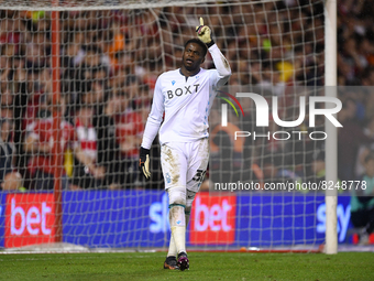 
Nottingham Forest goalkeeper Brice Samba gestures after saving a penalty during the Sky Bet Championship Play-Off Semi-Final match between...