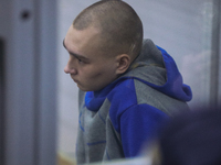 Russian soldier Vadim Shishimarin sits in the defendant's box at the opening of his trial on charge of War crimes for having killed a civili...