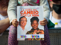 Supporters of left-wing vice-presidential candidate for the political alliance 'Pacto Historico' Francia Marquez, hold banners ans signs dur...