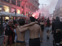 AC Milan fans celebrating Serie A title in Duomo square, in Milan, Italy, on May 23, 2022. (