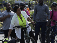 DC Mayor Muriel Bowser arrives on bike during Bike to Work Day event, today on February 25, 2021 at HVC/Capitol Hill in Washington DC, USA....