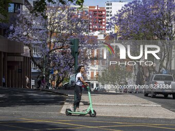 A person riding a skateboard is seen driving around Liberdade Avenue. Lisbon, May 23, 2022. Portugal is the European Union country with the...