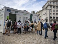 People are seen lining up to wait for a COVID-19 test at a stand located on Liberdade Avenue. Lisbon, May 23, 2022. Portugal is the European...