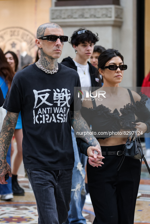 Kourtney Kardashian, Travis Barker and Landon Asher Barker are seen at Piazza Duomo on May 26, 2022 in Milan, Italy 