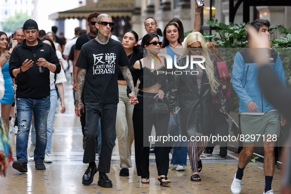 Kourtney Kardashian and Travis Barker are seen at Piazza Duomo on May 26, 2022 in Milan, Italy 