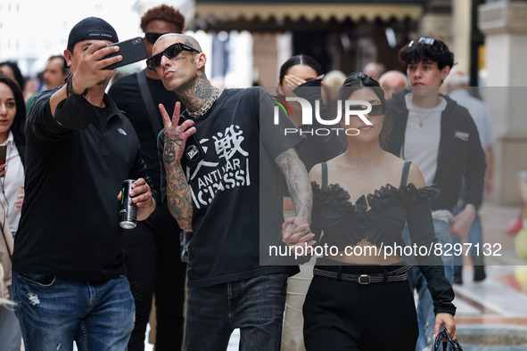 Kourtney Kardashian and Travis Barker are seen at Piazza Duomo on May 26, 2022 in Milan, Italy 