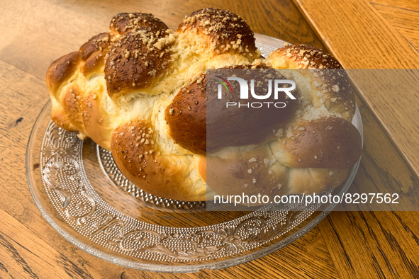 Braided bread called Chalka is seen on a restaurant's table in Krakow, Poland on May 24, 2022. 