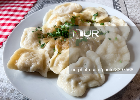 Filled dumplings called Pierogi are seen in a milk bar's table in Krakow, Poland on May 24, 2022. 