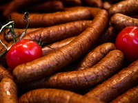 Sausages are seen on a stand in Krakow, Poland on May 25, 2022. (