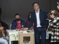 Gustavo Petro, candidate to the presidency for Pacto Histórico shows his vote to the media in a public school in Bogotá, Colombia, on Sunday...