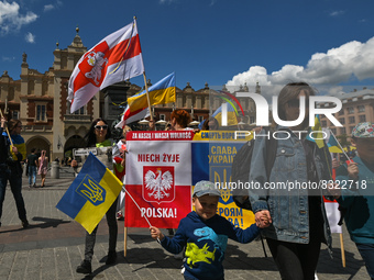 Members of the local Ukrainian diaspora, war refugges, peace activists, volunteers and local supporters during the 'Protests NATO Close the...