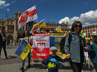 Members of the local Ukrainian diaspora, war refugges, peace activists, volunteers and local supporters during the 'Protests NATO Close the...