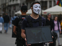 Activists from 'Anonymous for the Voiceless' - a grassroots animal rights organization specializing in street activism, seen during a protes...