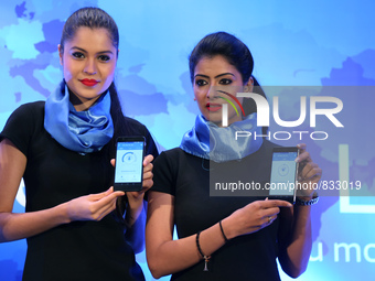Models pose during the launch of Worlds lightest all-in-one mobile solution app 360 Security Lite in Delhi, India on October 7,2015 (