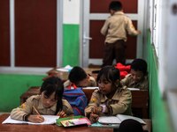 Students in a general class at a school in Tugu Utara Village, Regency Bogor, West Java province, Indonesia on 2 June, 2022. (