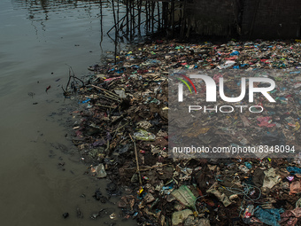 Household plastic waste is seen filling the side of a fisherman's settlement of Belawan sea coastal in Medan, North Sumatra province, Indone...