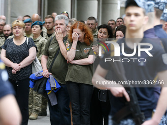 Relatives and friends of died Ukrainian serviceman Sergiy Derduga attend his funeral ceremony, amid Russia's invasion of Ukraine, in Odesa U...