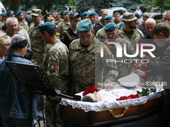 Relatives and friends of died Ukrainian serviceman Sergiy Derduga attend his funeral ceremony, amid Russia's invasion of Ukraine, in Odesa U...