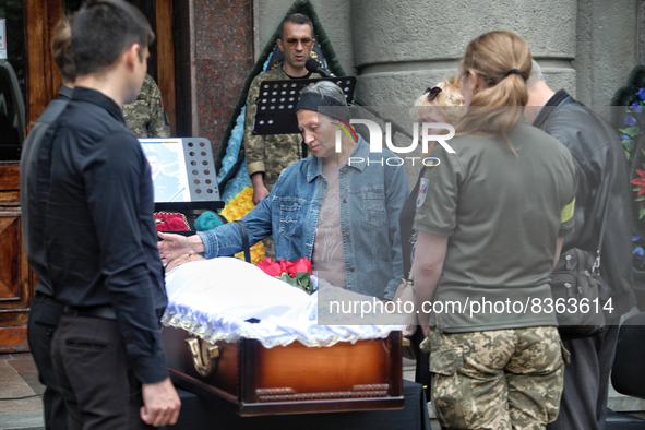 ODESA, UKRAINE - JUNE 6, 2022 - Relatives and friends stand by the coffin with the body of the commander of the 18th Separate Battalion of t...