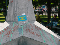 Protective unit with patriotic graffiti on the street of Poltava, Ukraine on June 6, 2022. (