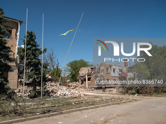 A bended flag pole is seen in front of the local administrative building, hit last night by a Kalibr, a Russian made rocket, in the city cen...