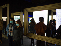 People take part in the immersive exhibition of Vincent Van Gogh's 'Beyond Van Gogh' experience that gathers his most important pieces of ar...