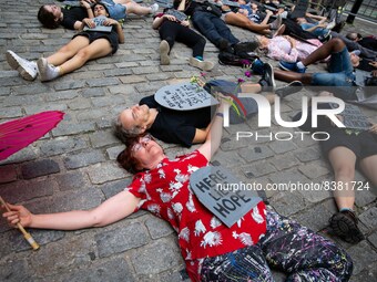 Fridays for Future New York City (FFF NYC) activists participated in a climate die-in at Bowling Green Park, New York City on June 10, 2022...