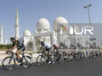 Riders pass in front of the Grande Mosque during The Capital second stage of the 2015 Abu Dhabi Tour, the 129 km from Yas Marina Circuit to...