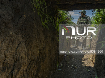 A ukrainian soldier inside a trench in the frontline of the Zaporizhzhia province, Ukraine. (