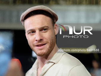 Turkish actor Kerem Bursin attends the photocall of the presentation of NFT in Madrid. June 14, 2022 Spain (