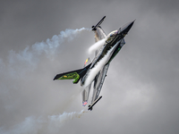 Belgium Air Force F-16 Solo Display Dream Viper performs during the RAF Cosford Air Show, Wolverhampton. Sunday 12 June 2022.  (