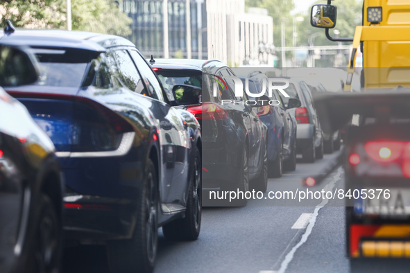 Cars stand in a traffic jam in Krakow, Poland on June 15, 2022. 