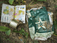 Remains of a food bag of the russian army and a map of Ukraine in the forests near Buda Babynetska village. Russian troops occupied large ex...
