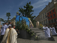 Corpus Christi procession in Krakow's Market Square.
The Feast of Corpus Christi, also known as the Solemnity of the Most Holy Body and Bloo...