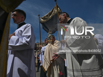 The Corpus Christi procession in Krakow's Market Square.
The Feast of Corpus Christi, also known as the Solemnity of the Most Holy Body and...