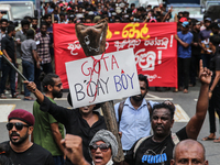 Sri Lankan university students march, against Sri Lanka's President Gotabaya Rajapaksa while demanding his resignation, amid the country's e...