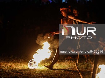 Villagers playing fire football, known locally as 