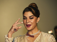 Bollywood actress Jacqueline Fernandez reacts during the trailer launch of their upcoming fantasy action-adventure thriller Kannada film 'Vi...