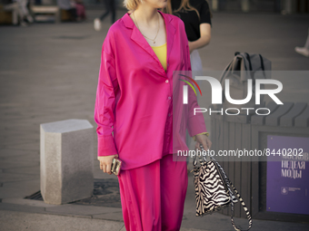 Street Style at AKHMADULLINA fashion show Moscow Fashion Week 23 June 2022, Moscow, Russia (